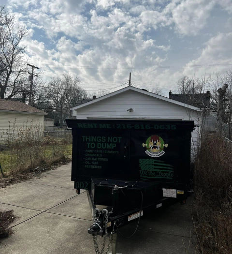 a recently dropped off dumpster for rental